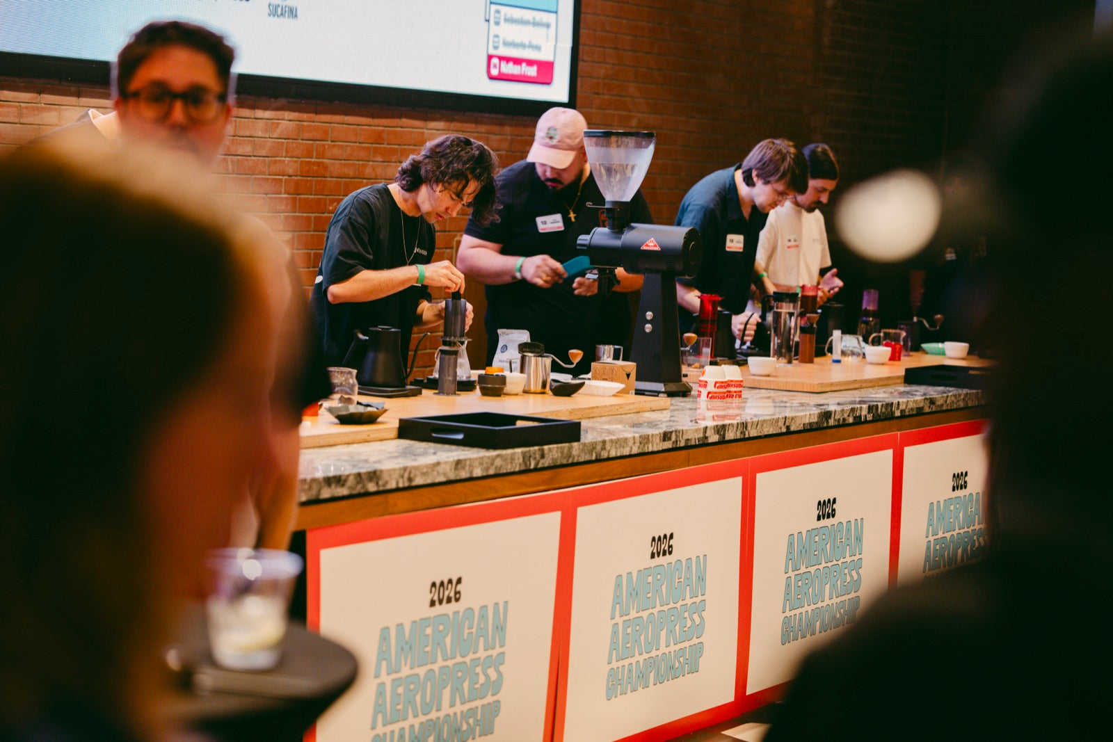 Competitors brewing head to head at the championship counter