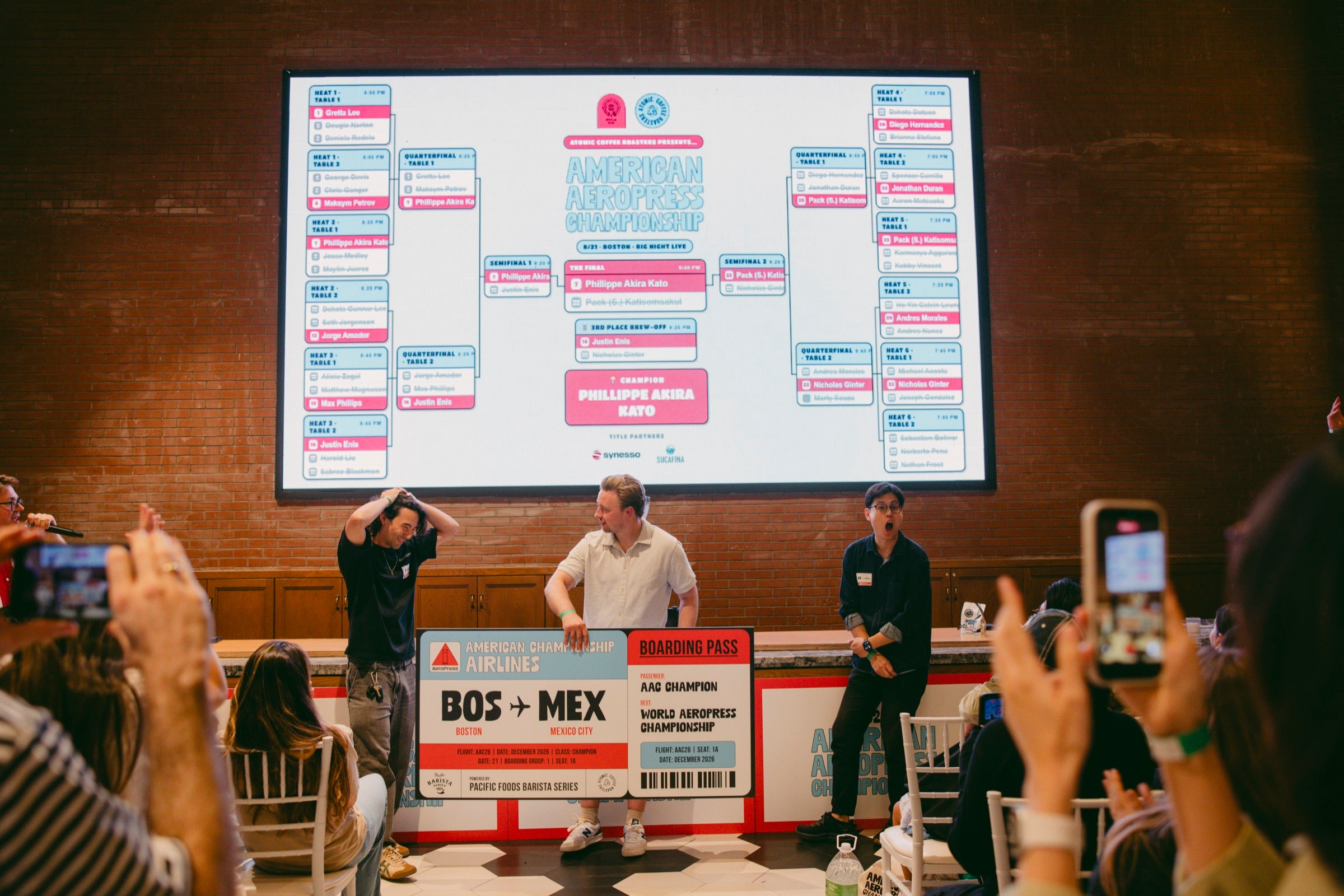 Phillippe Akira Kato announced as champion in front of the bracket wall at Big Night Live